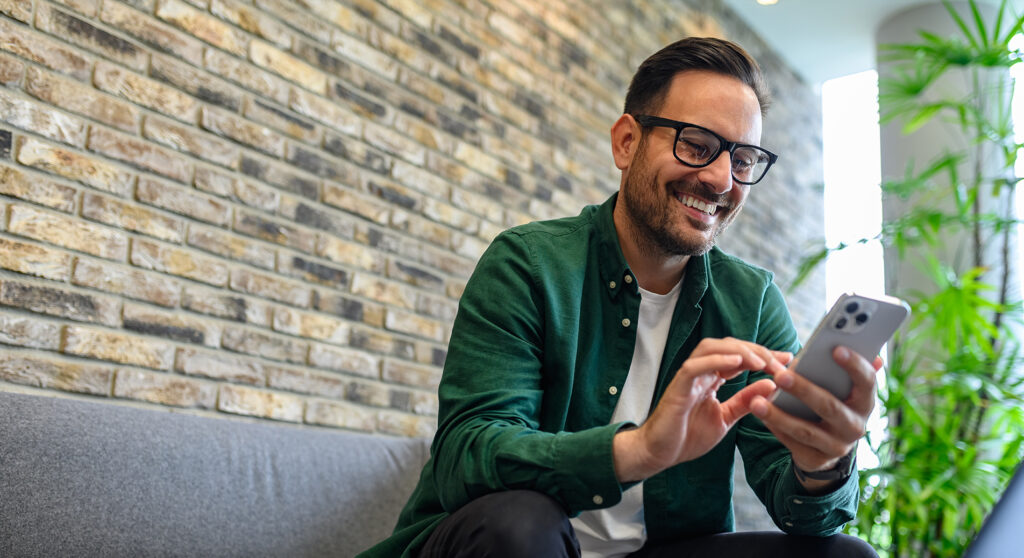 Man smiling on phone